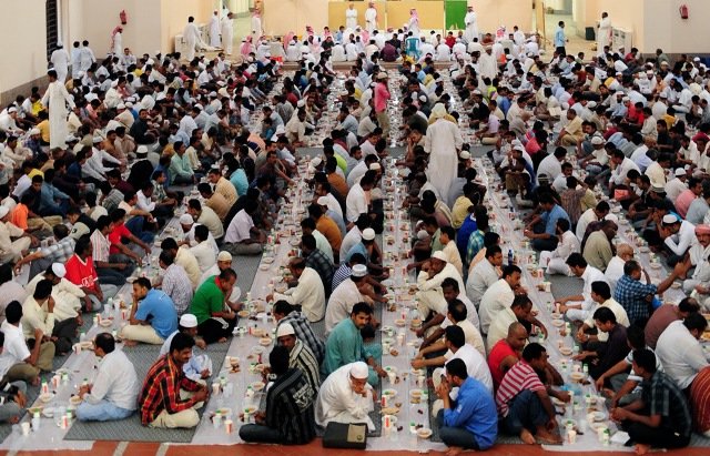 Muslim men break their fast at a mosque in the Saudi Red Sea port of Jeddah on August 23, 2009.